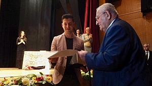 Birincilik A. Tamer Topuz'un